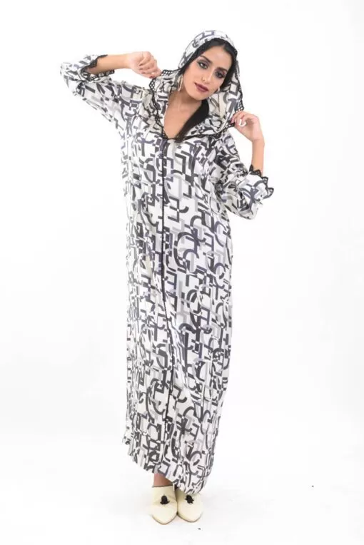 Modern Djellaba The traditional fashion - Moroccan modern Djellaba long sleeves, with hood. Worked with a pretty printed satin