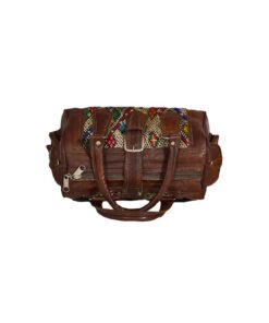 Travel bag in leather and kilim