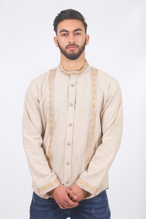 Beige shirt with orange embroidery