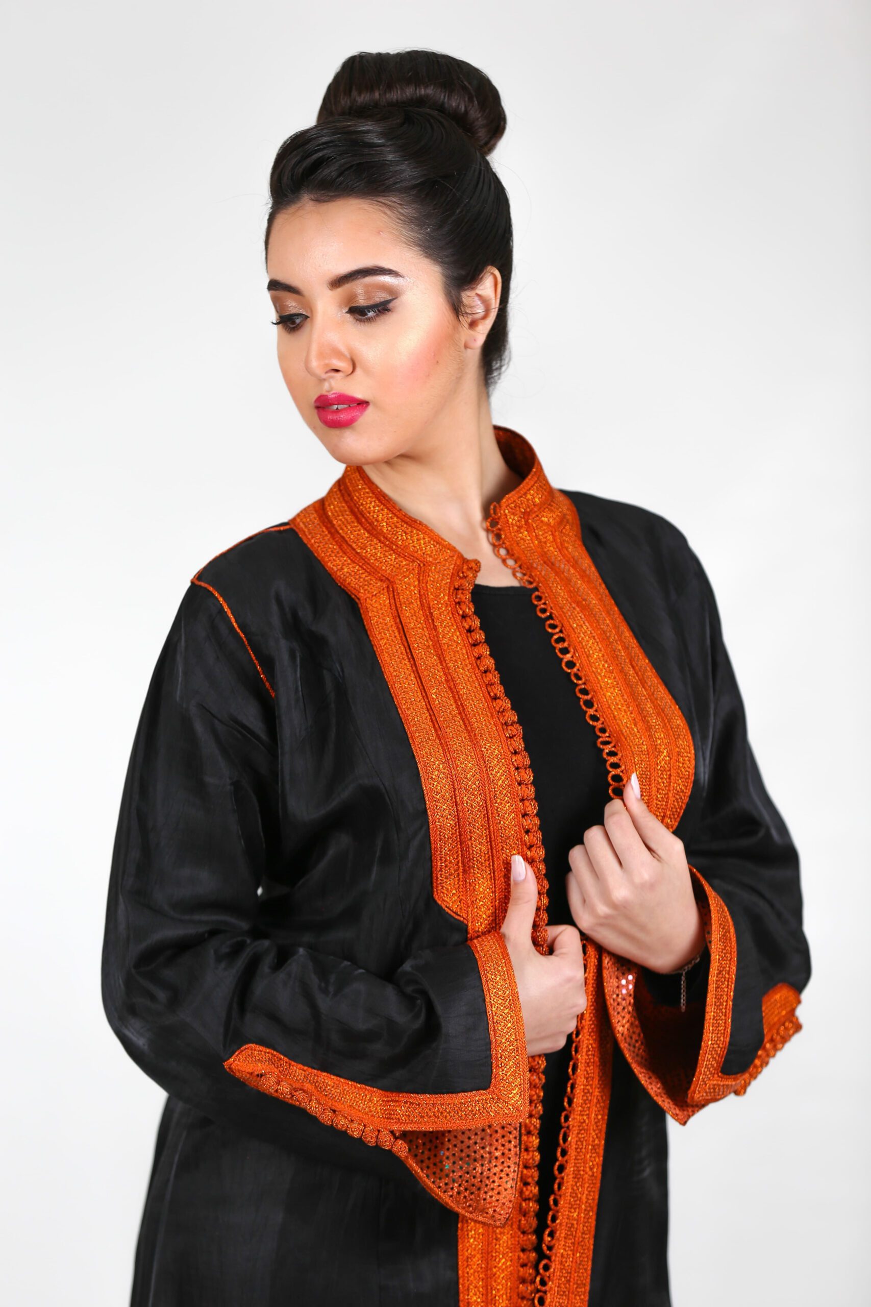 Black linen cape with orange glitter lining